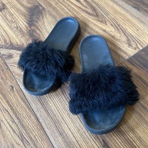Black fuzzy slides